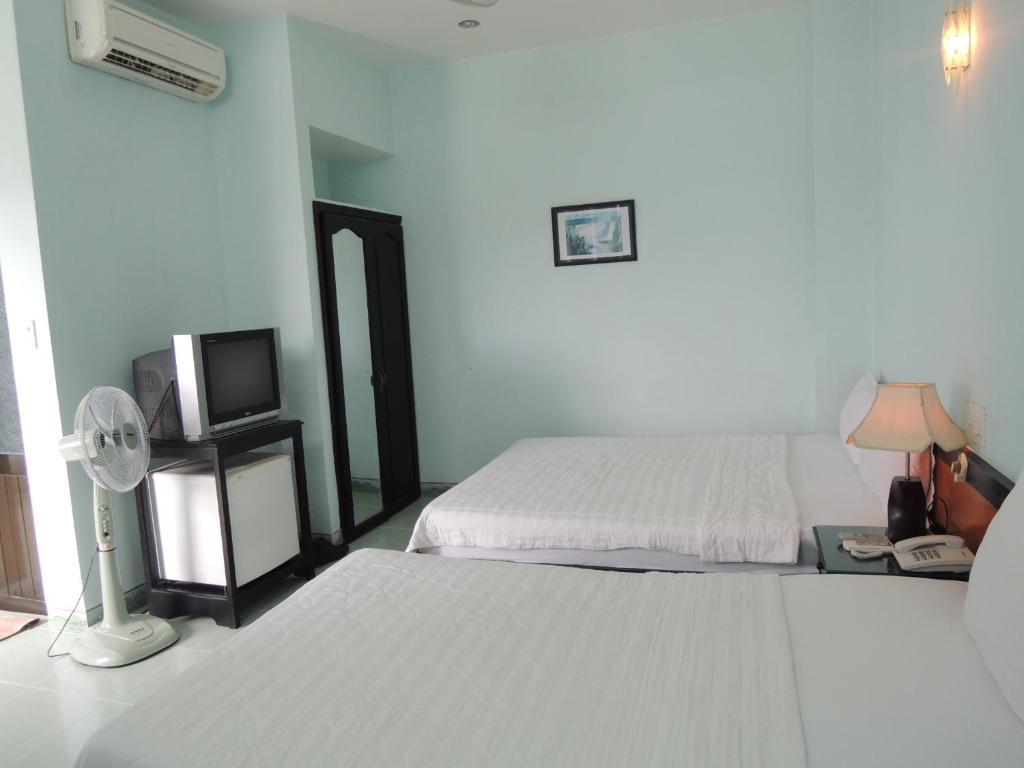 Hotel Four Seasons House Nha Trang Pokoj fotografie